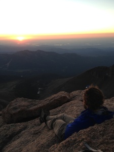 Watching the sun rise from the top of Longs